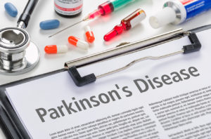 The diagnosis Parkinsons Disease written on a clipboard