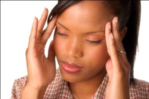 Woman with chronic headache, Migraine
